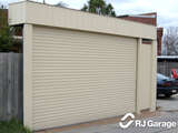 Fenceline Australian Roller Garage Door - Colorbond Colour 'Classic Cream' with Square Canopy