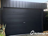 Fenceline Australian Roller Garage Door - Colorbond Colour 'Night Sky' with Square Canopy